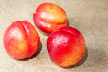 three red nectarines