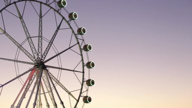 Ferris wheel in Bilbao at sunset.