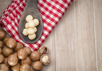 Macadamia nuts on a wooden table