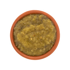 Bowl of culantro cooking sauce on a white background.