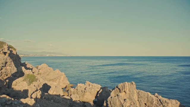 Rocks and blue sea - rocky turkish shore of mediterranean sea, Alanya, Turkey.