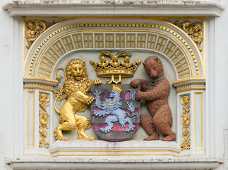Brugge, Belgium - August 10, 2016: Portrait of the Bruges Coat of Arms in three dimensional mural...