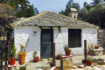 Fototapeta na wymiar Old stone house in village of Aliki,Thassos island, East Macedonia and Thrace, Greece 