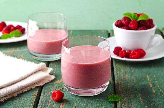 Healthy berry with raspberry, oatmeal and mint in a glass