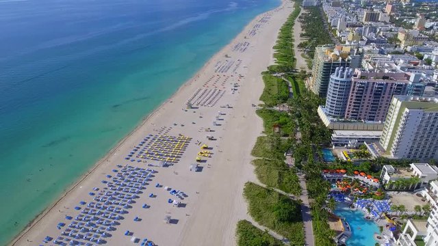 Aerial stock video of Miami Beach hotels on the beach