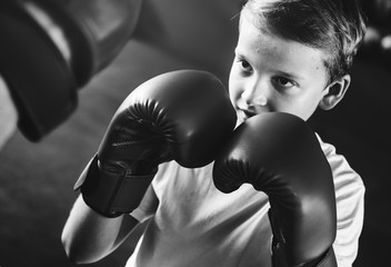 Fototapeta na wymiar Boy Training Boxing Exercise Movement Concept