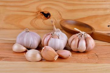  garlic on the wooden background