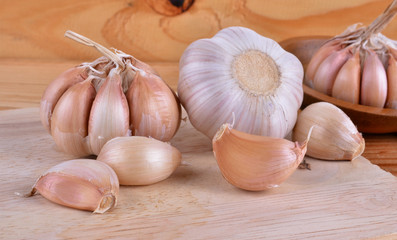  garlic on the wooden background