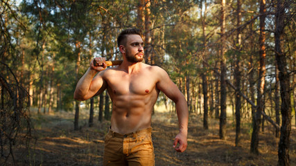 Lumberjack with a naked torso.