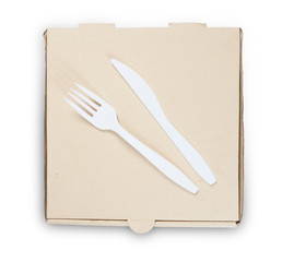 Blank pizza box with Plastic knife and fork isolated on white ba
