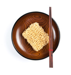 Instant noodles in bowl on wooden,Top view