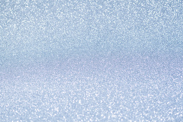 Abstract blue defocused glitter background