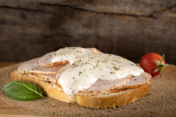 Open faced chicken ham sandwich with garilic sauce