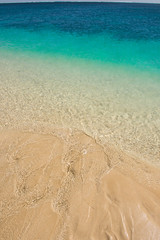 Fototapeta na wymiar Beautiful ocean beach crystal clear water