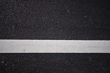 Asphalt road with separation white lines