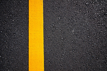 Asphalt road with separation yellow lines