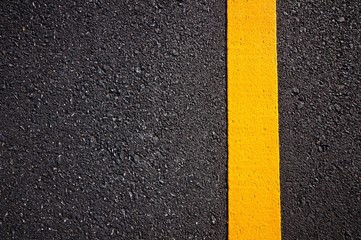 Asphalt road with separation yellow lines