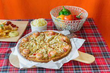 Delicious pizza with seafood