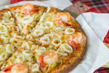 Delicious pizza with seafood