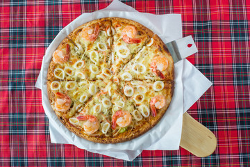 Delicious pizza with seafood