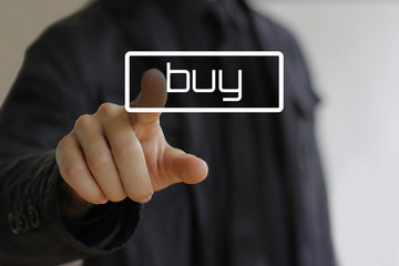 Businessman clicks on the buy black button