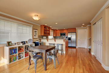 Open floor plan. Dining and kitchen room interior.