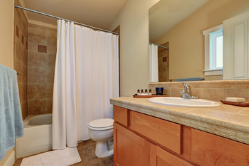 Modern bathroom vanity cabinet with drawers and marble top