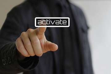Businessman clicks on the activate button