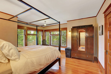 Interior of master bedroom with canopy bed