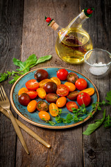Salad with fresh colorful tomatoes