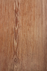 Brown wooden texture; vertical frame with copyspace