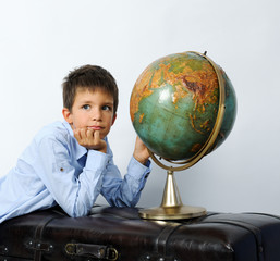 boy with vintage globe