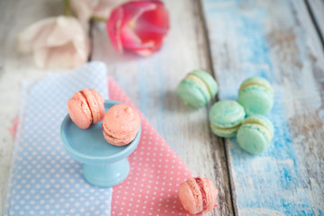 Vanilla macarons with strawberry and peanut butter ganache