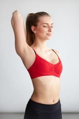 Fototapeta na wymiar fitness woman stretching arms back