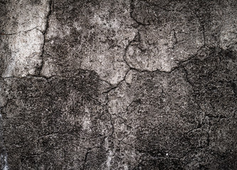 Cracked concrete texture closeup background