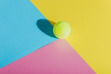 minimal creative concept with tennis ball in the middle