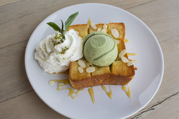 Ice cream green tea on honey toast and whip cream