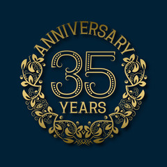 Fototapeta premium Golden emblem of thirty fifth years anniversary. Celebration patterned logotype with shadow on blue.