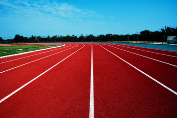 athletic, background, compete, competition, course, exercise, field, ground, lane, number, outdoor, race, racetrack, red, rubber, run, sport, stadium, start, surface, texture, track, white
