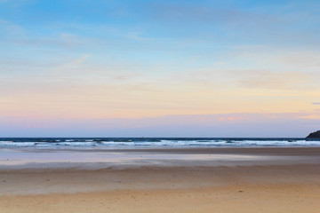 Fototapeta na wymiar Early morning view over the beach at Polzeath