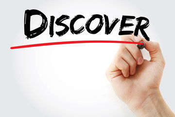 Hand writing DISCOVER with marker, concept background