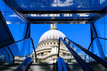 St Pauls Cathedral seen from an escalator exiting from One New Change building in London