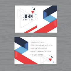 Modern and clean design business card template in blue and red triangle abstract background. Printing design template. Vector illustration.