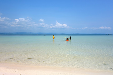 people doing kayak on the clear blue sea, blurred for background usage