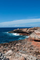 Fototapeta na wymiar Fomentera, Isole Baleari: le scogliere e la costa di Punta de La Gavina, a ovest dell’isola, il 2 settembre 2010