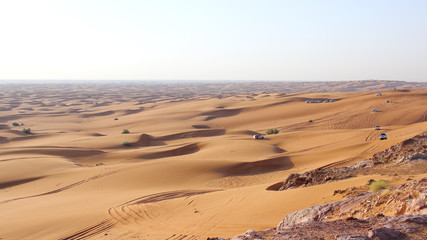 Fototapeta na wymiar Traveler car on a desert safari