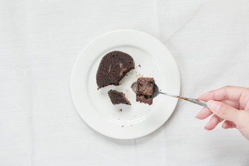 Eating chocolate cake