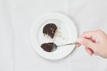 Eating chocolate cake