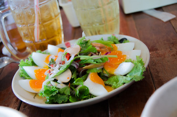 Spicy salad with boiled eggs