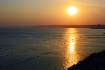 Fototapeta premium Mussel farms in the bay of Kavarna, Black Sea, Bulgaria on sunset